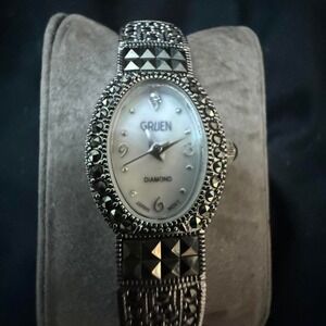 Gruen diamond watch with black and silver accents